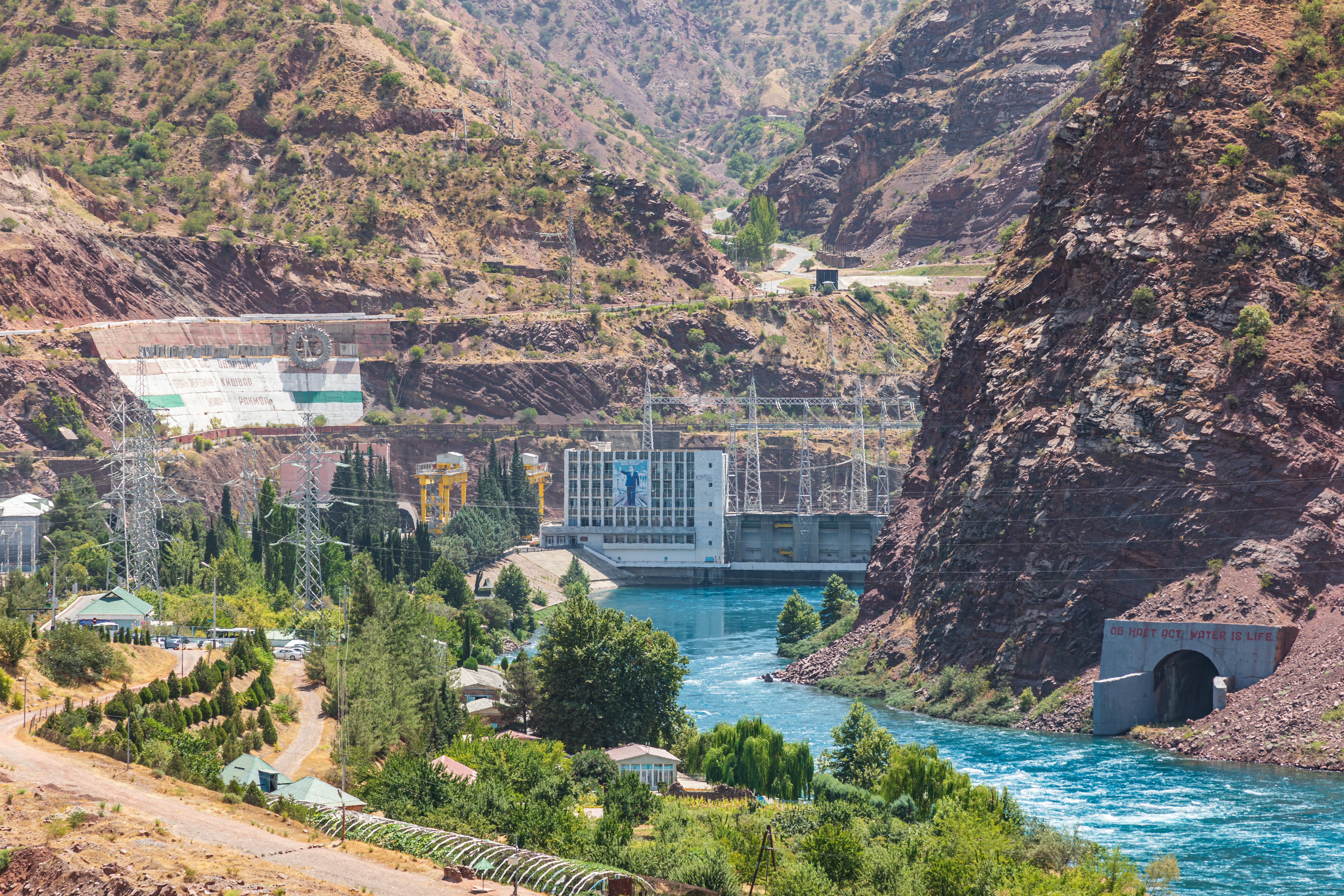 Powerhouse and electrical lines on the Nurek Dam, on the Kyzylsu River