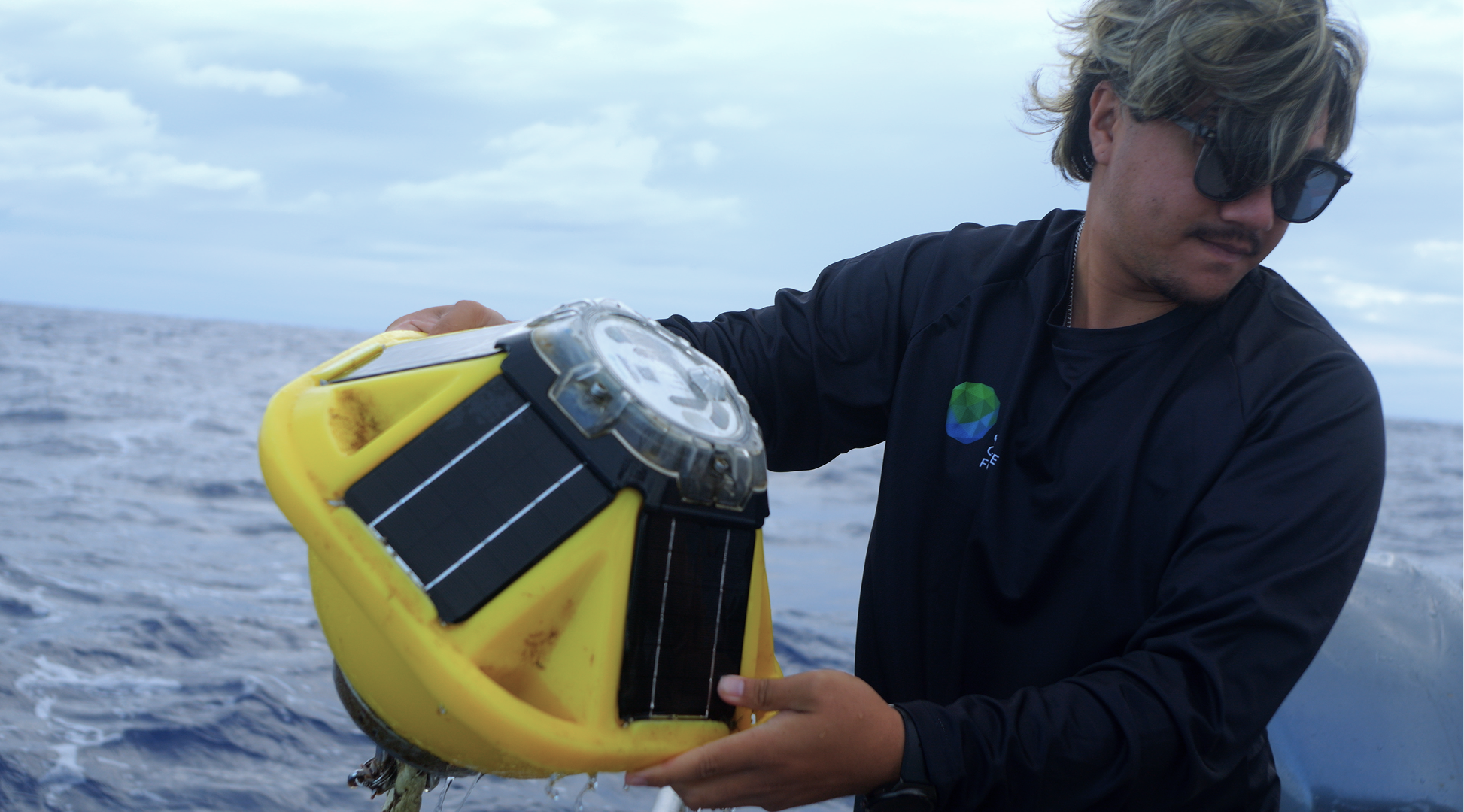 Samuel Nga, Principal Technician at the Cook Islands Meteorological Office, sets up a wave buoy to monitor wave height and storm intensity. The wave buoy is part of an early warning system in a GCF-funded project, expanding climate information use and access for authorities and communities. Photo: GCF / Flinch Marketing
