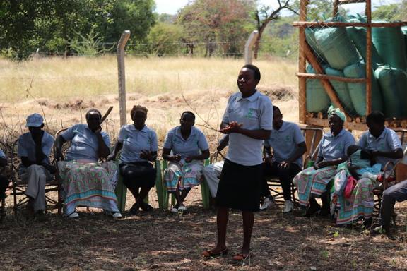 A community member speaks about the impact of the project on her family. She can support her family and pay school fees through the Grass Seed Bank initiative. Photo credit: IUCN.