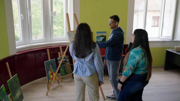 Various activities take place inside the Cultural Centre. One of the well-lit rooms houses paintings by the local art club. Photo/GCF Christopher Rompre
