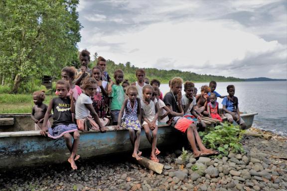 An increase in rain is making it difficult for the children from Mary’s village to attend school. Photo: Collin Leafasia/Save the Children