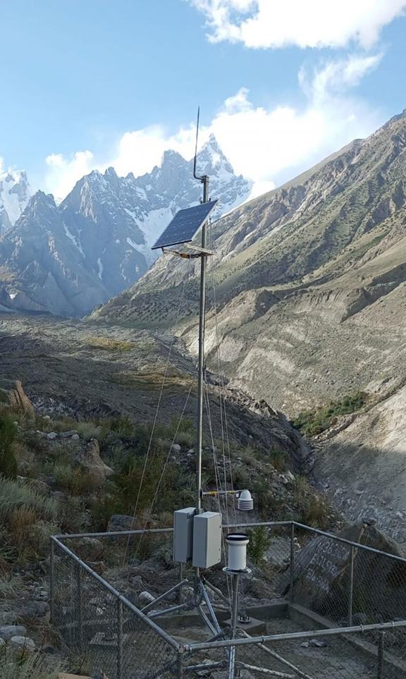 An automatic rain gauge (as part of an early warning system) in Shisper, Pakistan. Early warning systems comprise advanced automatic weather stations, rain gauges, snow depth sensors, water depth gauges, water discharge gauges, and warning posts. These systems enhance the climate resilience of communities by enabling timely response to disasters such as glacial lake outburst floods. Photo: Pakistan Meteorological Department/Abdur Rahman