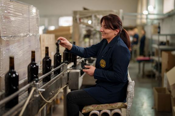 A worker at the factory processing the Areni grapes and packaging. Photo: EBRD